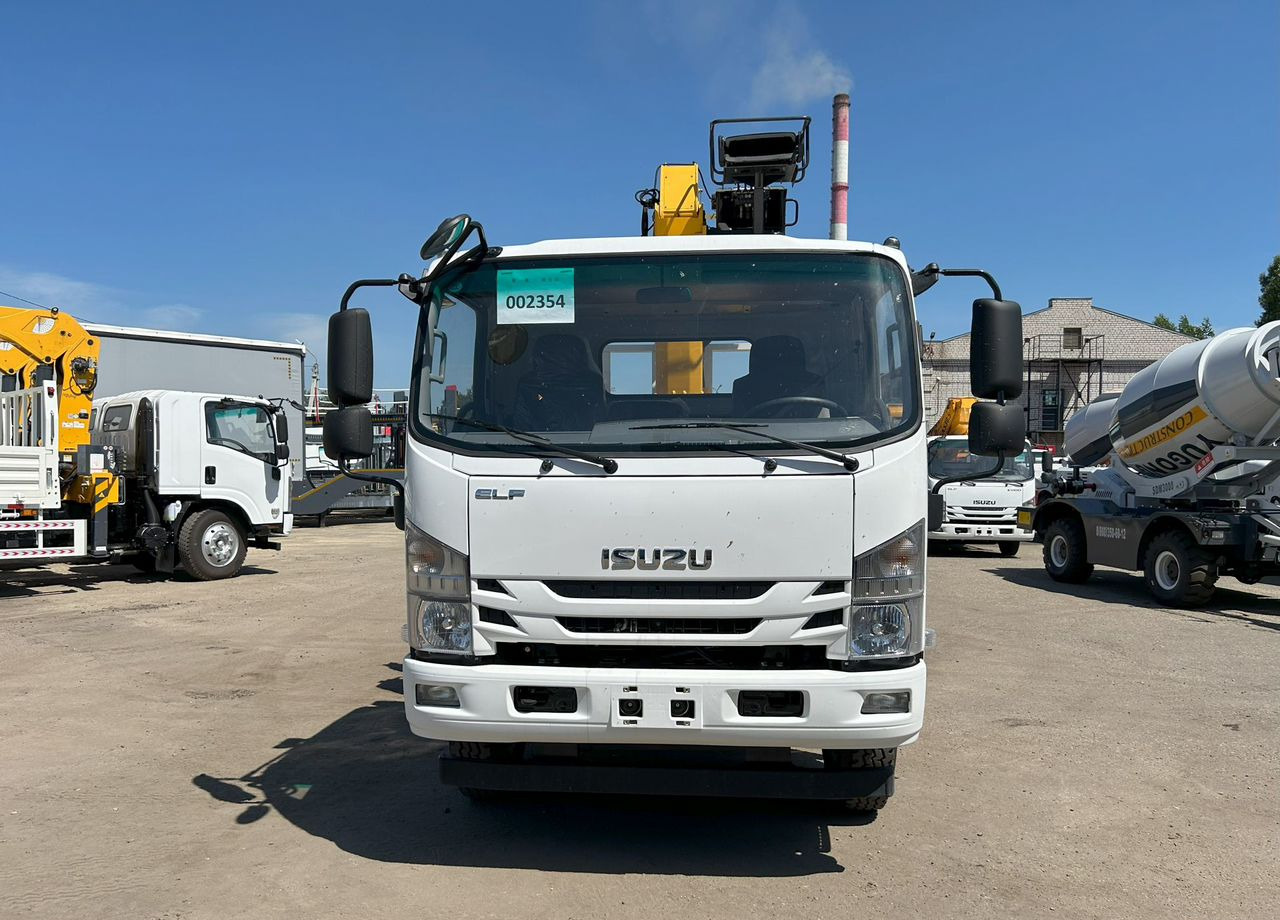 Isuzu Elf (N-series) - Грузовик бортовой/ Платформа, Автоманипулятор: фото 2 Isuzu Elf (N-series) - Грузовик бортовой/ Платформа, Автоманипулятор: фото 2