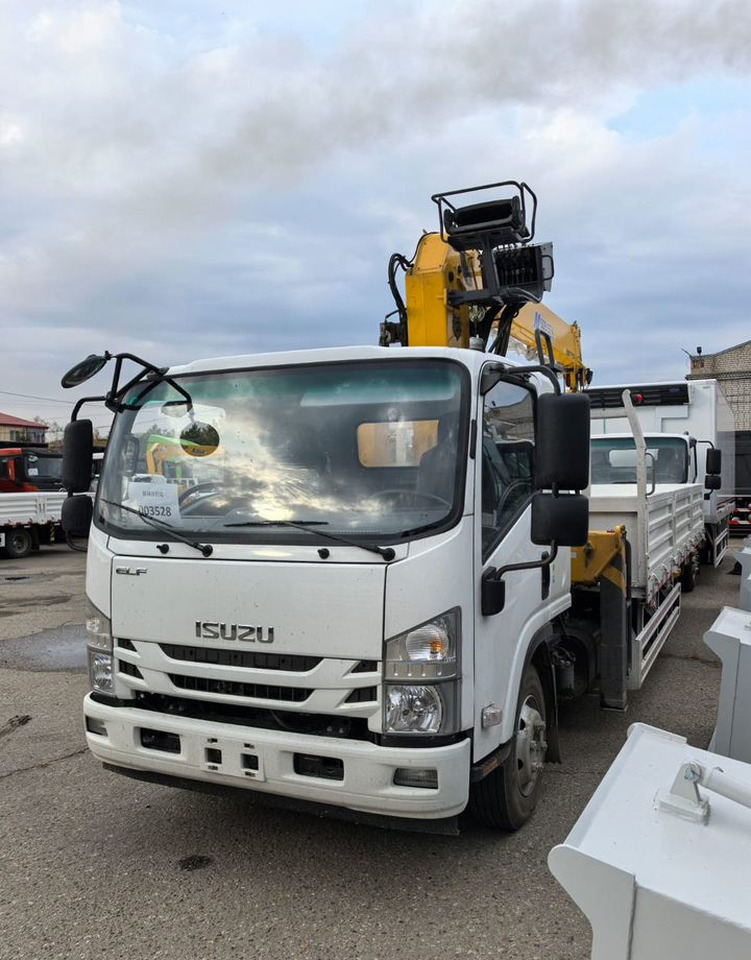 Isuzu Elf (N-series) - Грузовик бортовой/ Платформа, Автоманипулятор: фото 5 Isuzu Elf (N-series) - Грузовик бортовой/ Платформа, Автоманипулятор: фото 5