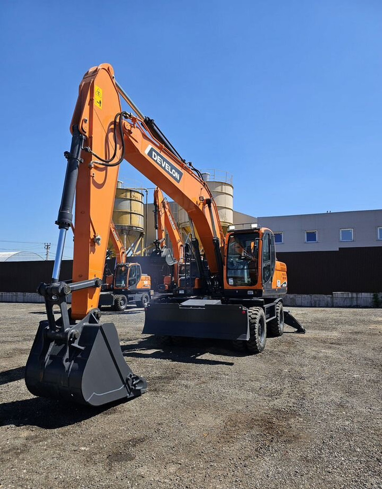 DOOSAN DX210WA - Колёсный экскаватор: фото 1 DOOSAN DX210WA - Колёсный экскаватор: фото 1