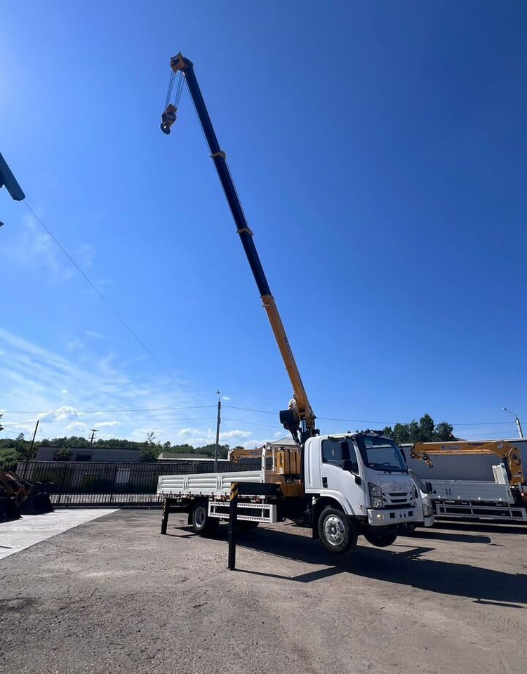 Isuzu Elf (N-series) - Грузовик бортовой/ Платформа, Автоманипулятор: фото 3 Isuzu Elf (N-series) - Грузовик бортовой/ Платформа, Автоманипулятор: фото 3