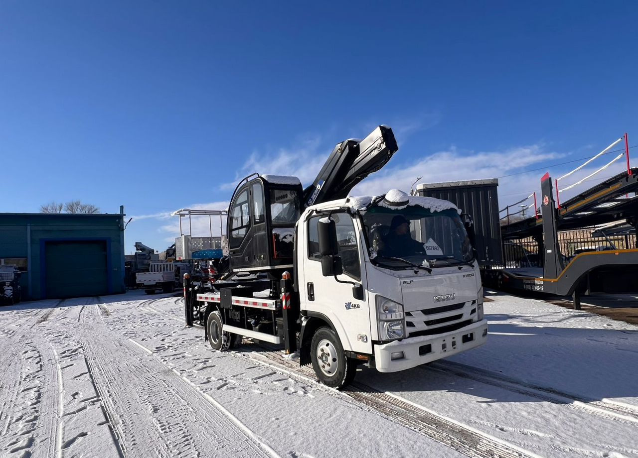 Isuzu Elf - Грузовик с подъемником: фото 2 Isuzu Elf - Грузовик с подъемником: фото 2