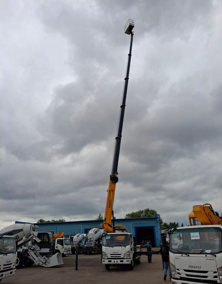 Новый Грузовик с подъемником Isuzu Elf: фото 9