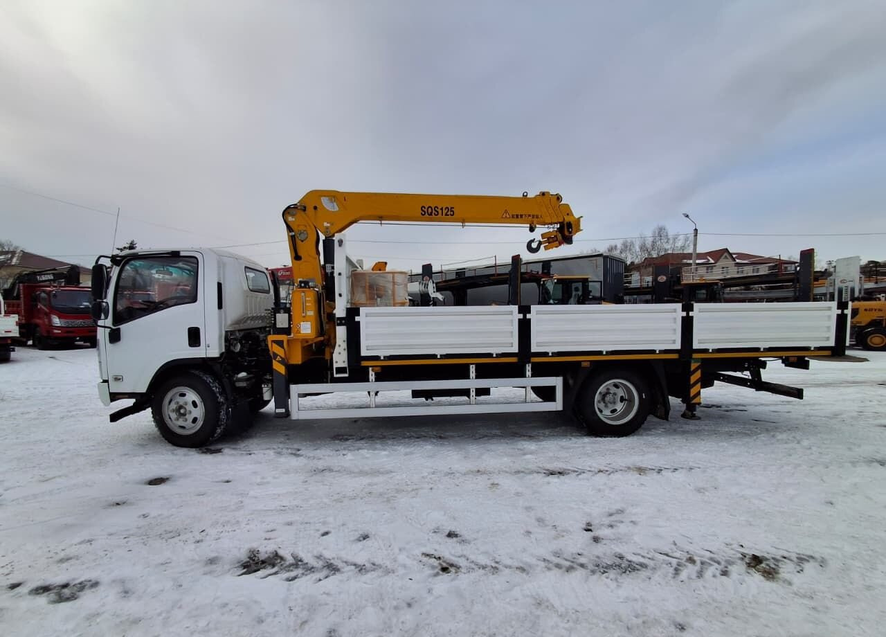 Isuzu Elf - Грузовик бортовой/ Платформа, Автоманипулятор: фото 2 Isuzu Elf - Грузовик бортовой/ Платформа, Автоманипулятор: фото 2