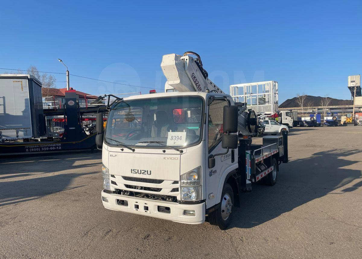Isuzu Elf - Грузовик с подъемником: фото 1 Isuzu Elf - Грузовик с подъемником: фото 1