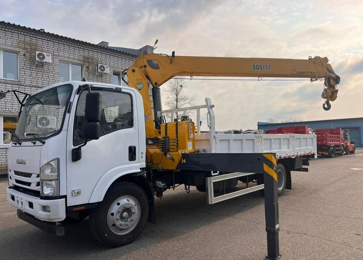 Isuzu Elf - Бортовой грузовик/ Платформа, Автоманипулятор: фото 1 Isuzu Elf - Бортовой грузовик/ Платформа, Автоманипулятор: фото 1