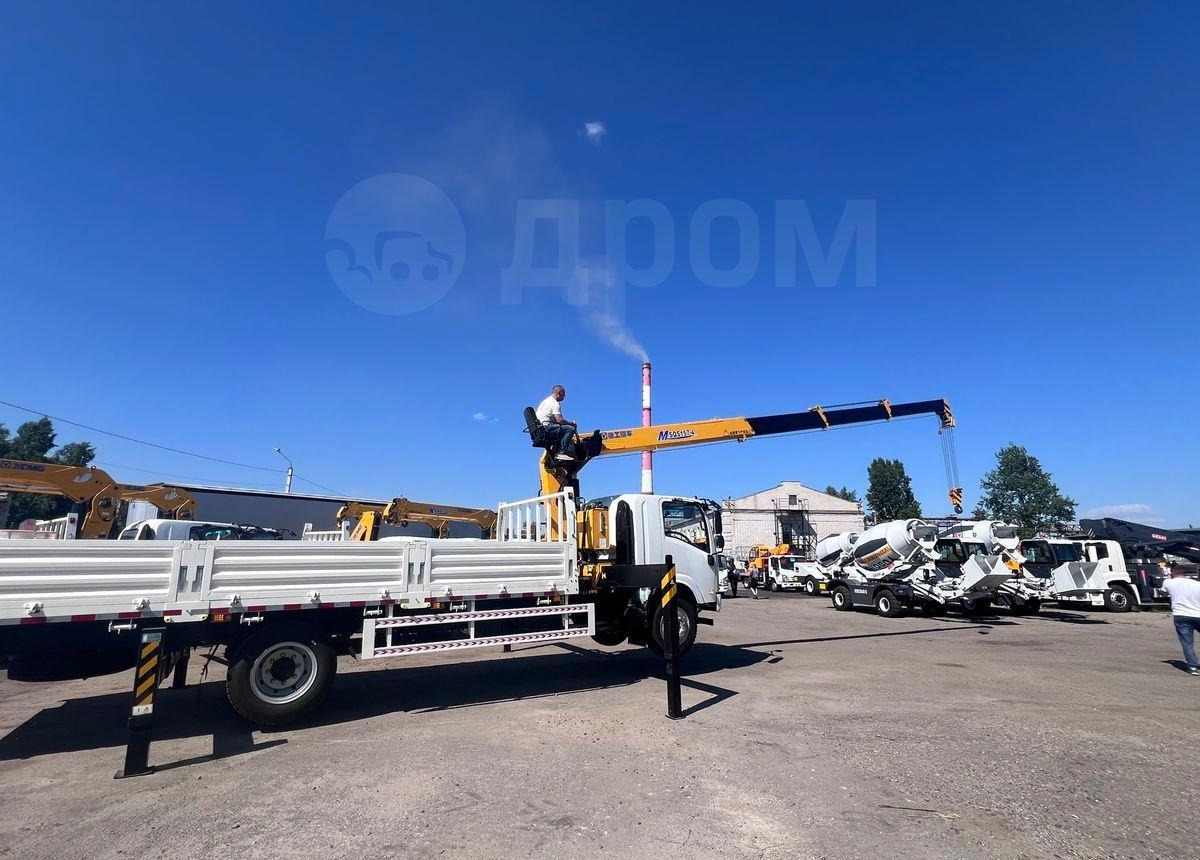 Isuzu Elf - Грузовик бортовой/ Платформа, Автоманипулятор: фото 5 Isuzu Elf - Грузовик бортовой/ Платформа, Автоманипулятор: фото 5