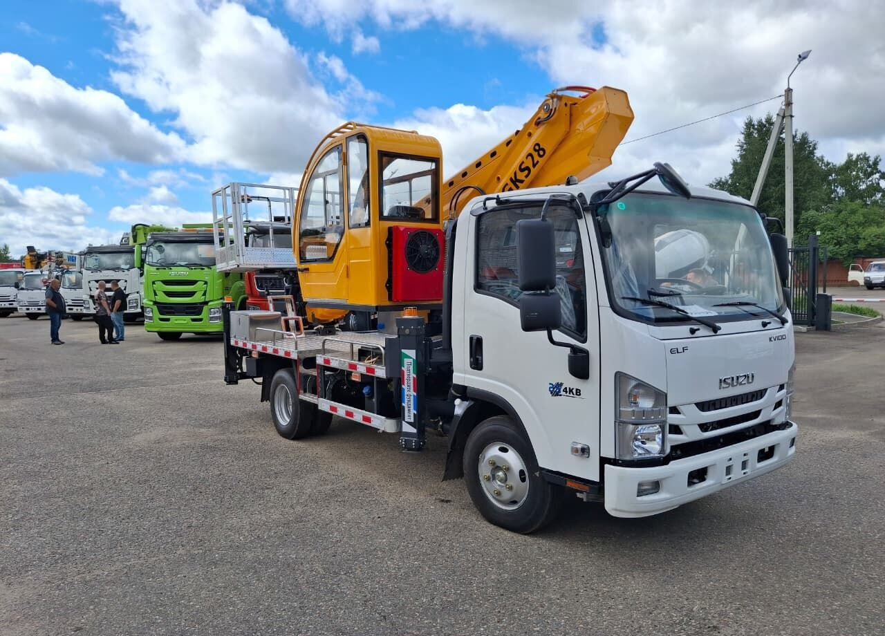 Isuzu Elf - Грузовик с подъемником: фото 1 Isuzu Elf - Грузовик с подъемником: фото 1