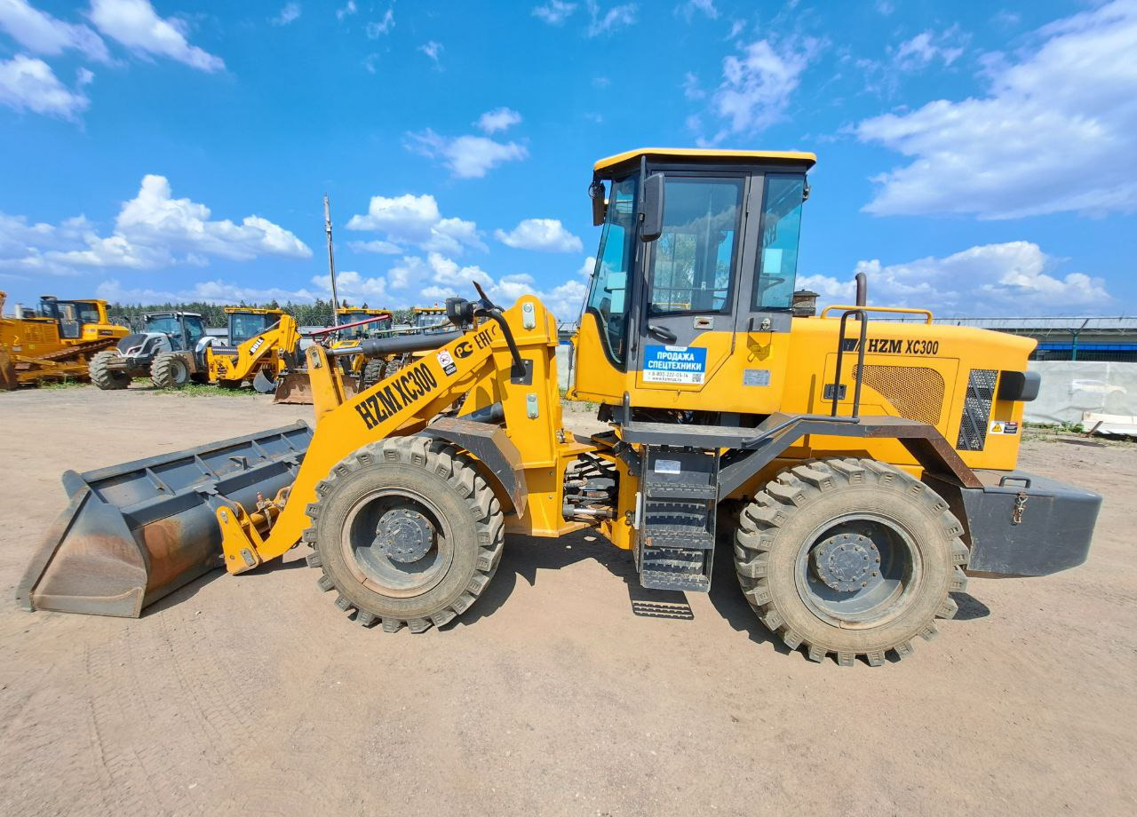 Фронтальный погрузчик HZM XC300 - Колёсный погрузчик: фото 1 Фронтальный погрузчик HZM XC300 - Колёсный погрузчик: фото 1