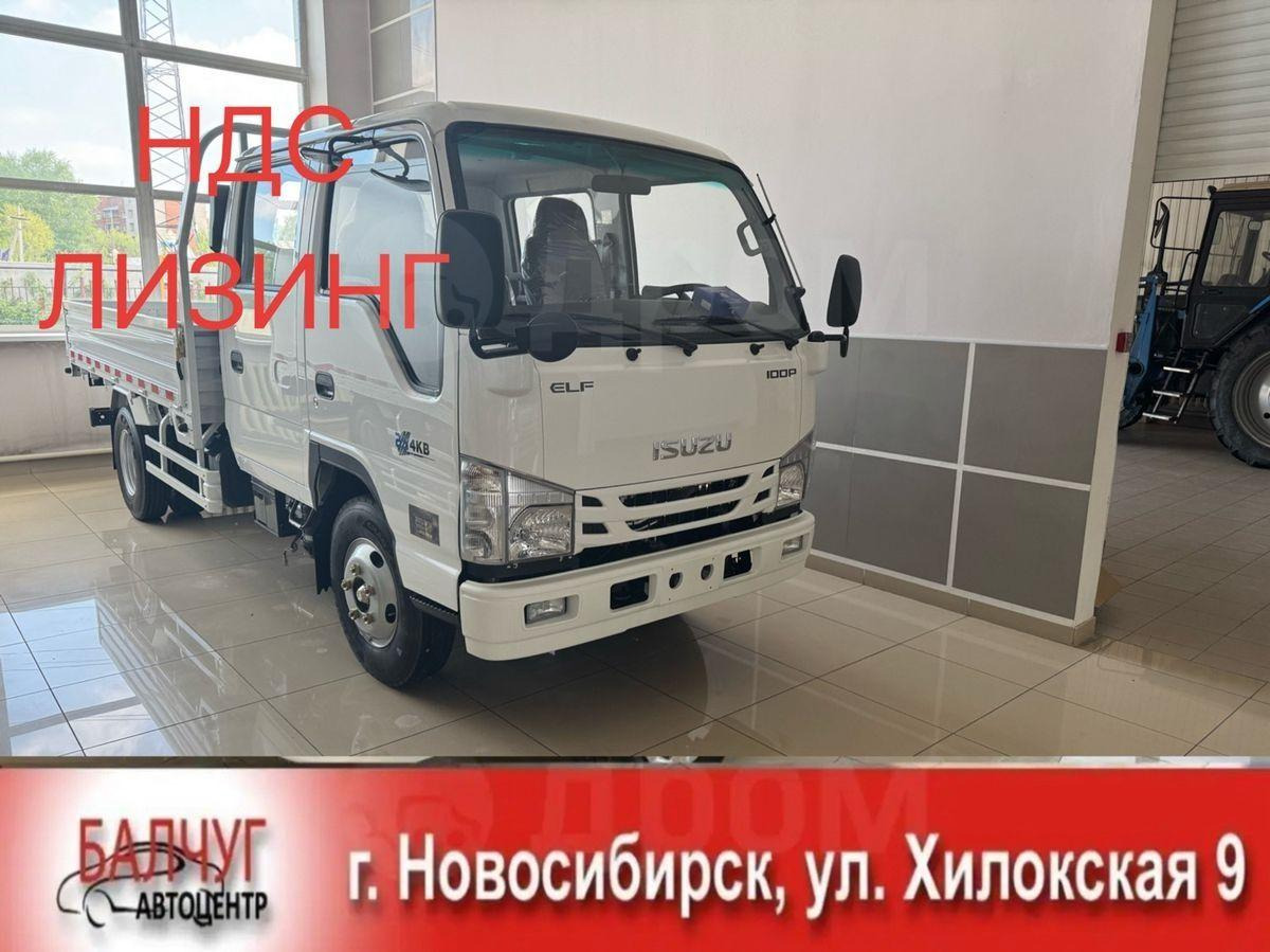 Isuzu Elf - Грузовик бортовой/ Платформа: фото 1 Isuzu Elf - Грузовик бортовой/ Платформа: фото 1