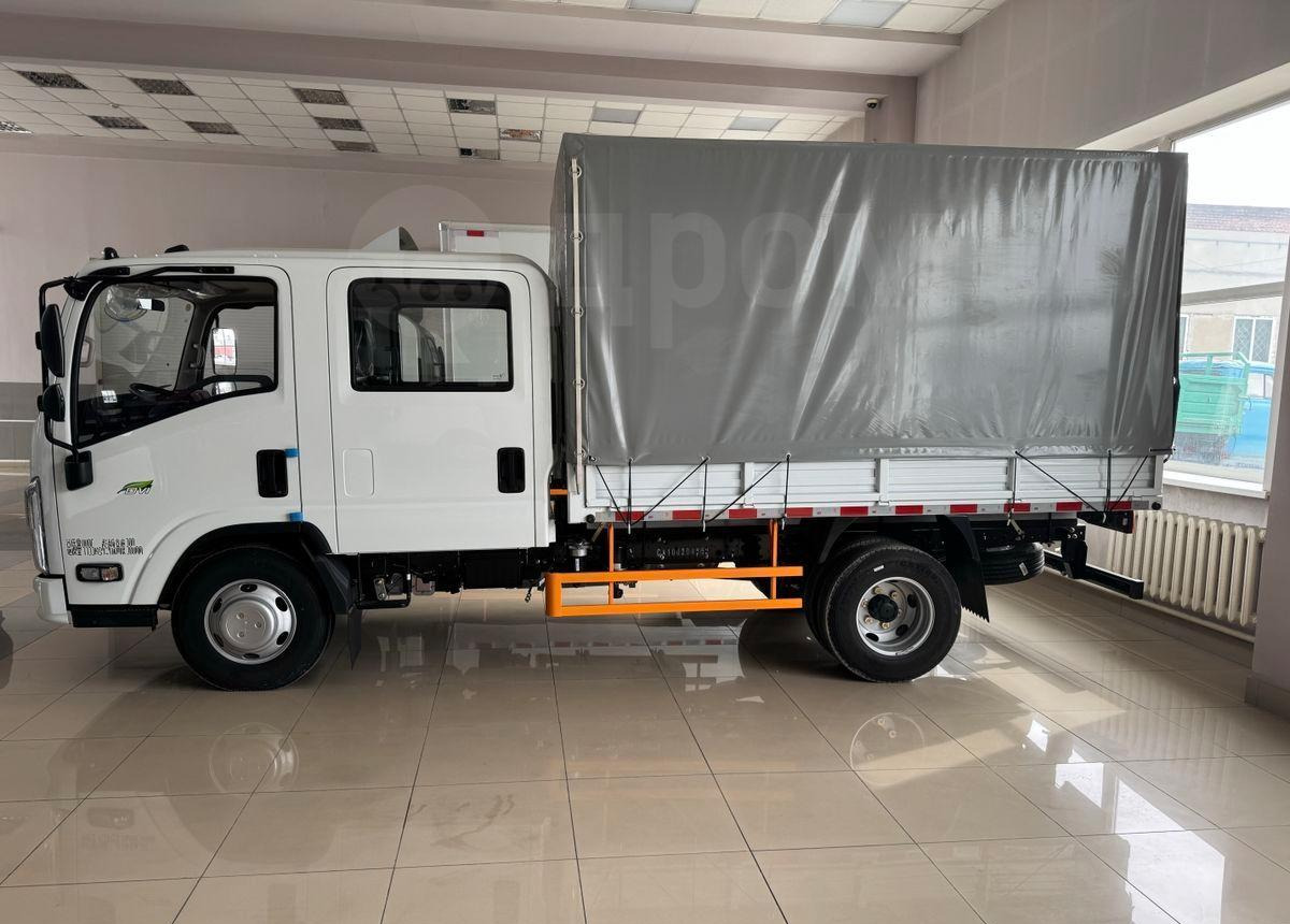 Isuzu Elf - Бортовой грузовик/ Платформа: фото 2 Isuzu Elf - Бортовой грузовик/ Платформа: фото 2