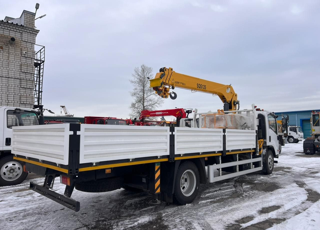 Isuzu Elf (N-series) - Бортовой грузовик/ Платформа, Автоманипулятор: фото 4 Isuzu Elf (N-series) - Бортовой грузовик/ Платформа, Автоманипулятор: фото 4