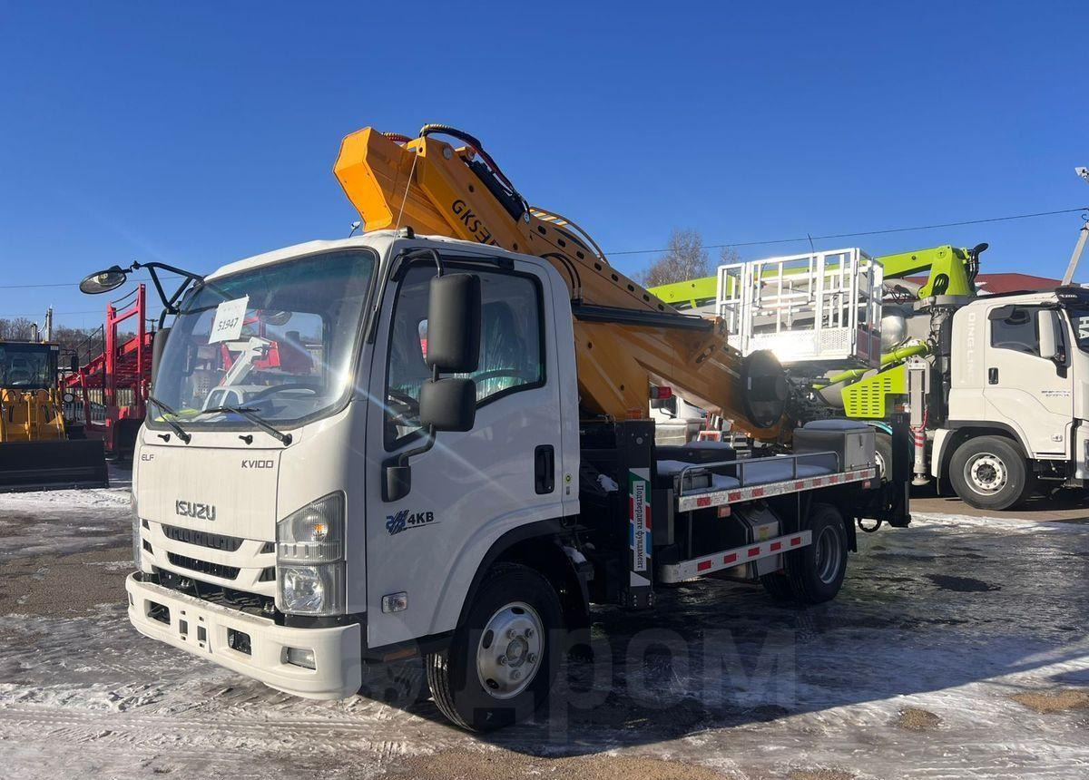 Isuzu Elf - Грузовик с подъемником: фото 2 Isuzu Elf - Грузовик с подъемником: фото 2