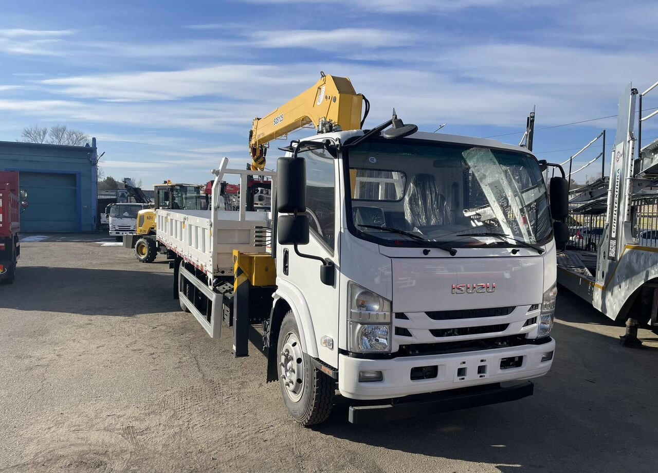 Isuzu Elf - Бортовой грузовик/ Платформа, Автоманипулятор: фото 1 Isuzu Elf - Бортовой грузовик/ Платформа, Автоманипулятор: фото 1