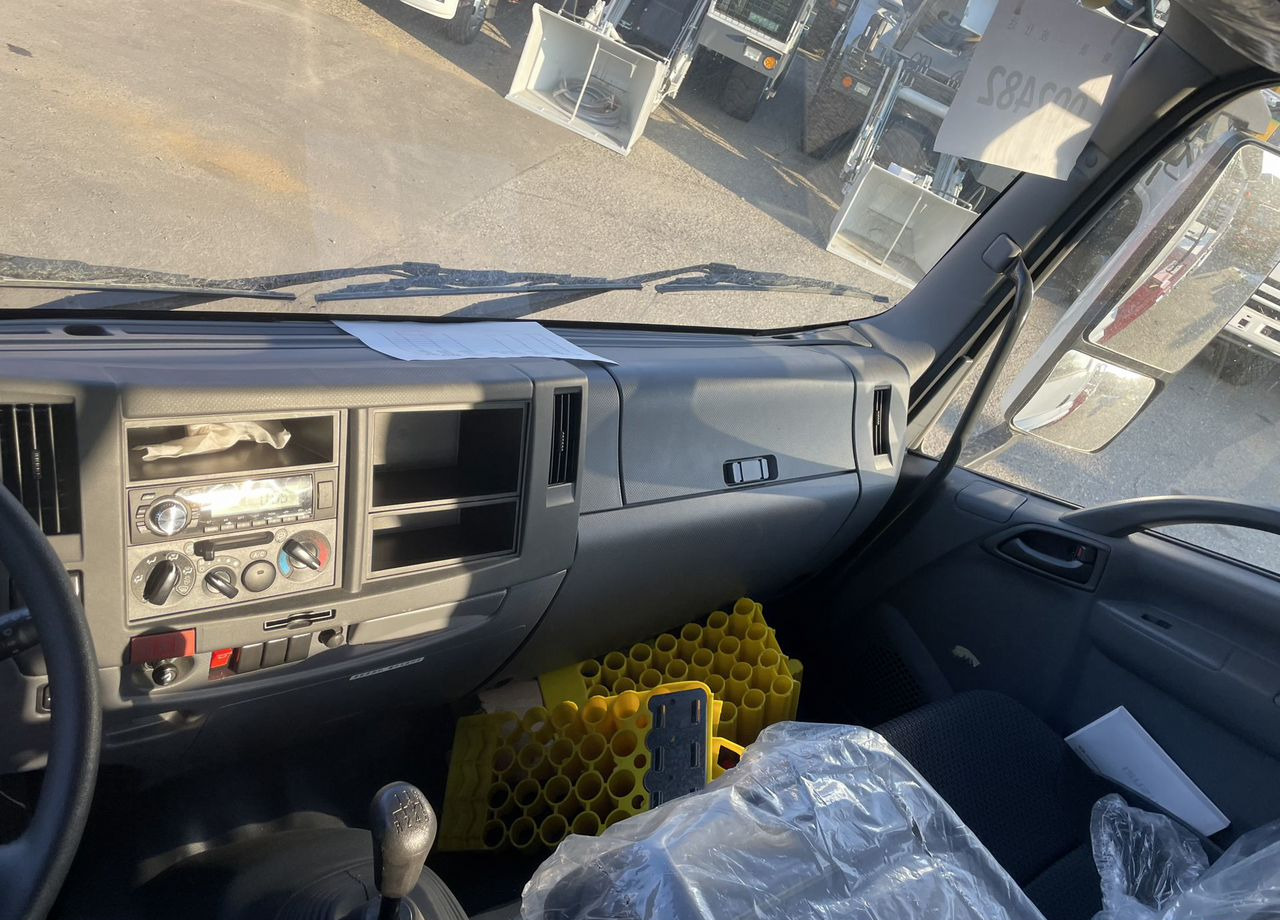 Новый Грузовик бортовой/ Платформа, Автоманипулятор Isuzu Elf: фото 14 Новый Грузовик бортовой/ Платформа, Автоманипулятор Isuzu Elf: фото 14