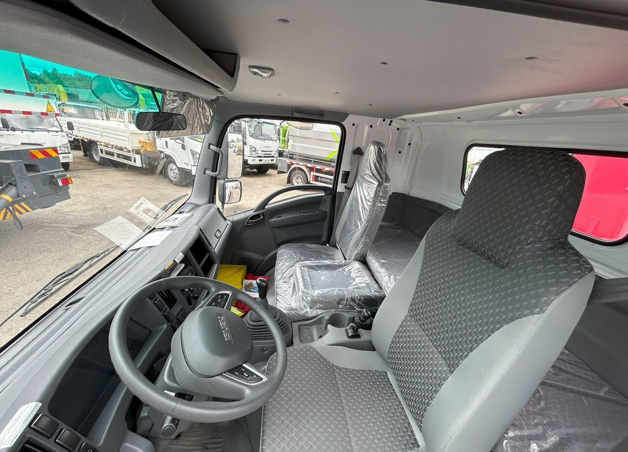 Новый Грузовик бортовой/ Платформа, Автоманипулятор Isuzu Elf: фото 7 Новый Грузовик бортовой/ Платформа, Автоманипулятор Isuzu Elf: фото 7