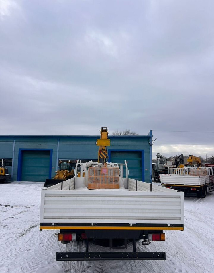 Isuzu Elf - Бортовой грузовик/ Платформа, Автоманипулятор: фото 5 Isuzu Elf - Бортовой грузовик/ Платформа, Автоманипулятор: фото 5