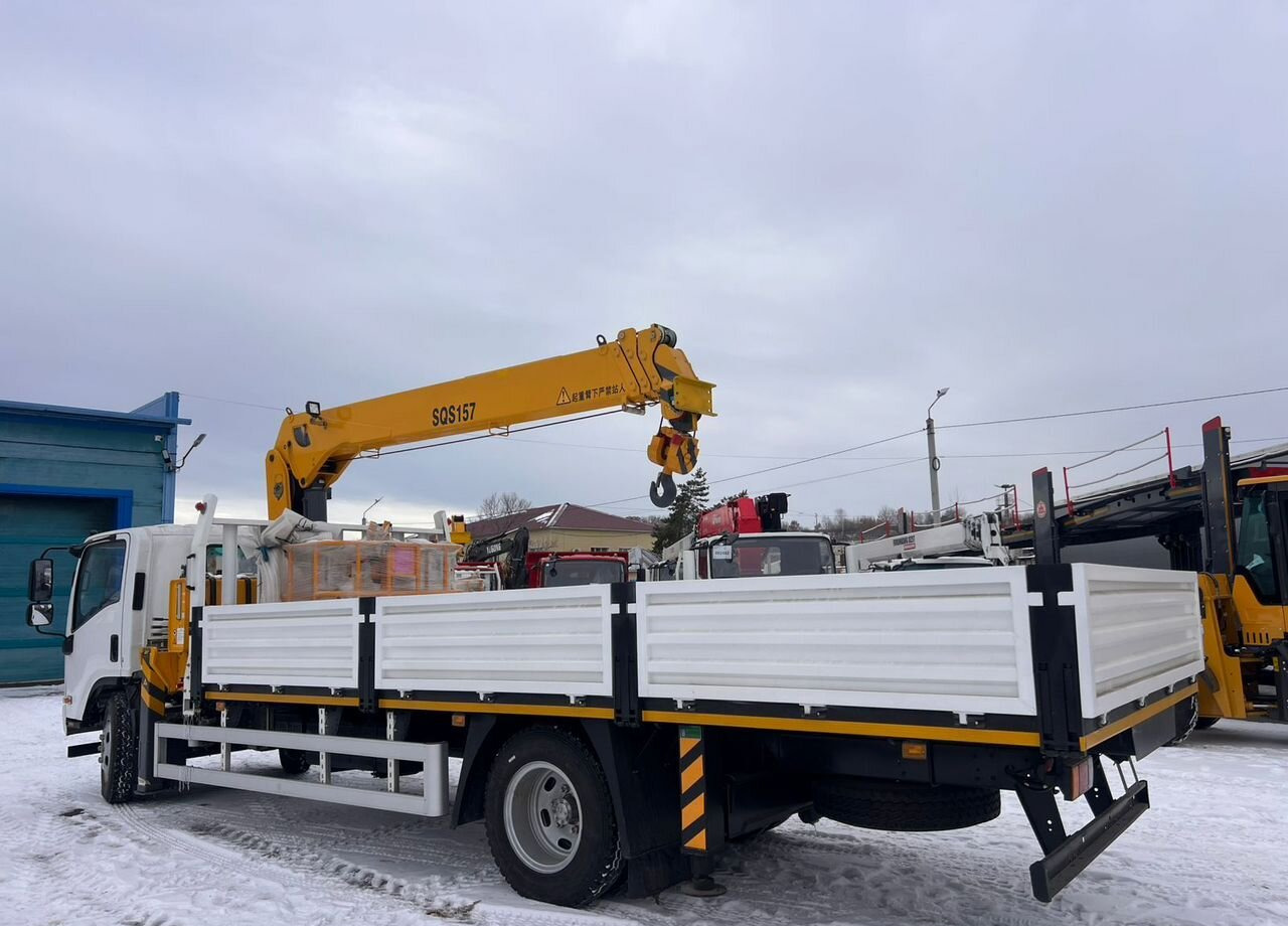 Isuzu Elf - Бортовой грузовик/ Платформа, Автоманипулятор: фото 4 Isuzu Elf - Бортовой грузовик/ Платформа, Автоманипулятор: фото 4