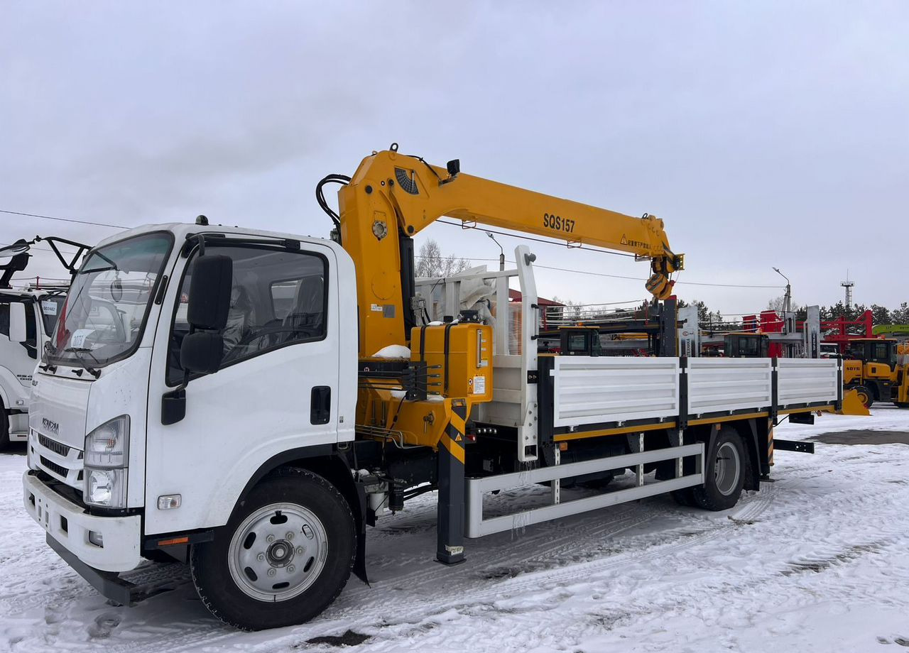 Isuzu Elf - Бортовой грузовик/ Платформа, Автоманипулятор: фото 1 Isuzu Elf - Бортовой грузовик/ Платформа, Автоманипулятор: фото 1