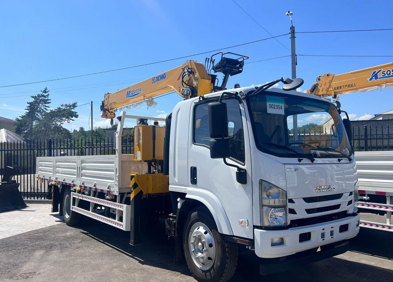 Isuzu Elf (N-series) - Грузовик бортовой/ Платформа, Автоманипулятор: фото 1 Isuzu Elf (N-series) - Грузовик бортовой/ Платформа, Автоманипулятор: фото 1