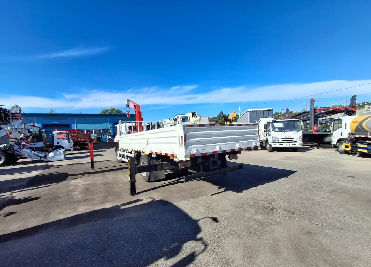 Isuzu Elf (N-series) - Грузовик бортовой/ Платформа, Автоманипулятор: фото 5 Isuzu Elf (N-series) - Грузовик бортовой/ Платформа, Автоманипулятор: фото 5