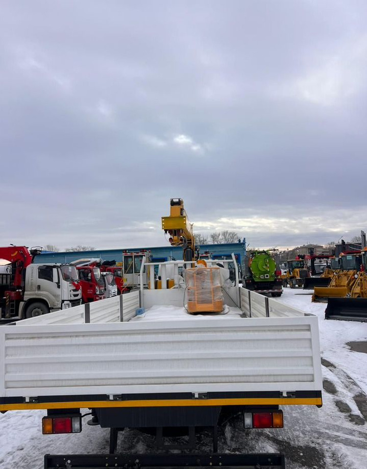 Isuzu Elf (N-series) - Грузовик бортовой/ Платформа, Автоманипулятор: фото 5 Isuzu Elf (N-series) - Грузовик бортовой/ Платформа, Автоманипулятор: фото 5