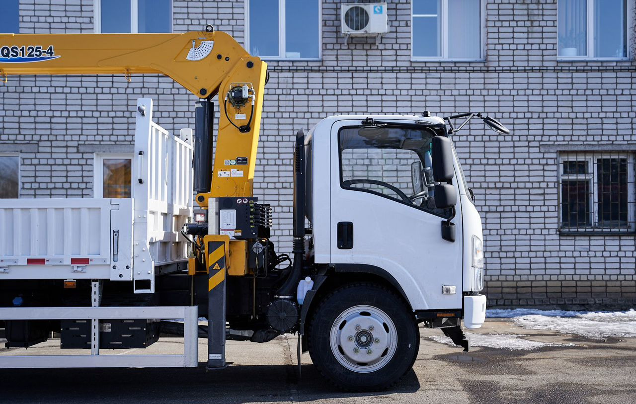 Isuzu Elf (N-series) - Грузовик бортовой/ Платформа, Автоманипулятор: фото 5 Isuzu Elf (N-series) - Грузовик бортовой/ Платформа, Автоманипулятор: фото 5