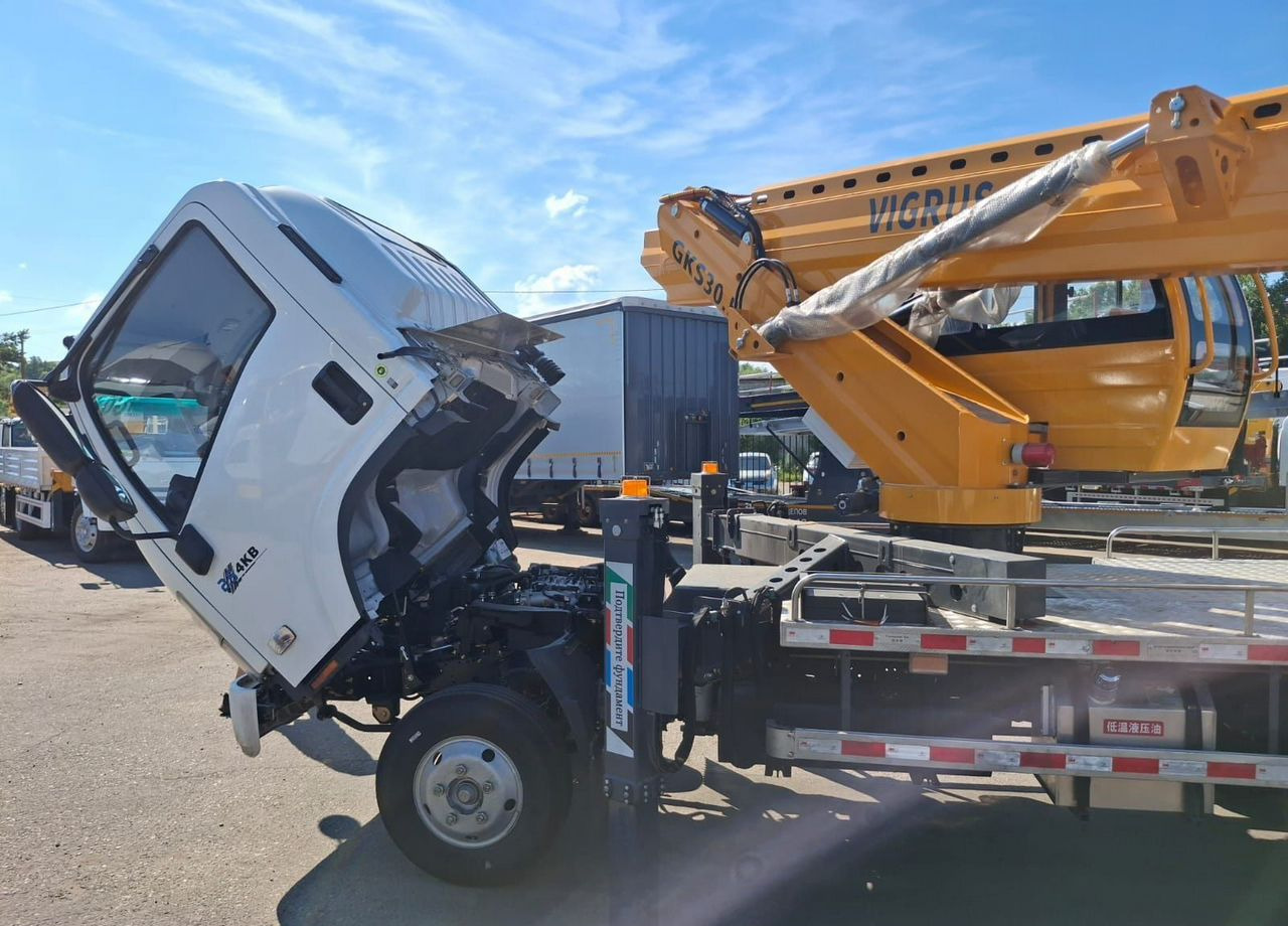 Новый Грузовик с подъемником Isuzu Elf: фото 8 Новый Грузовик с подъемником Isuzu Elf: фото 8