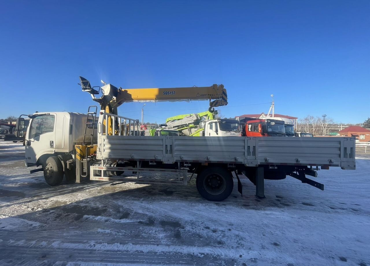 Isuzu Elf - Грузовик бортовой/ Платформа, Автоманипулятор: фото 5 Isuzu Elf - Грузовик бортовой/ Платформа, Автоманипулятор: фото 5