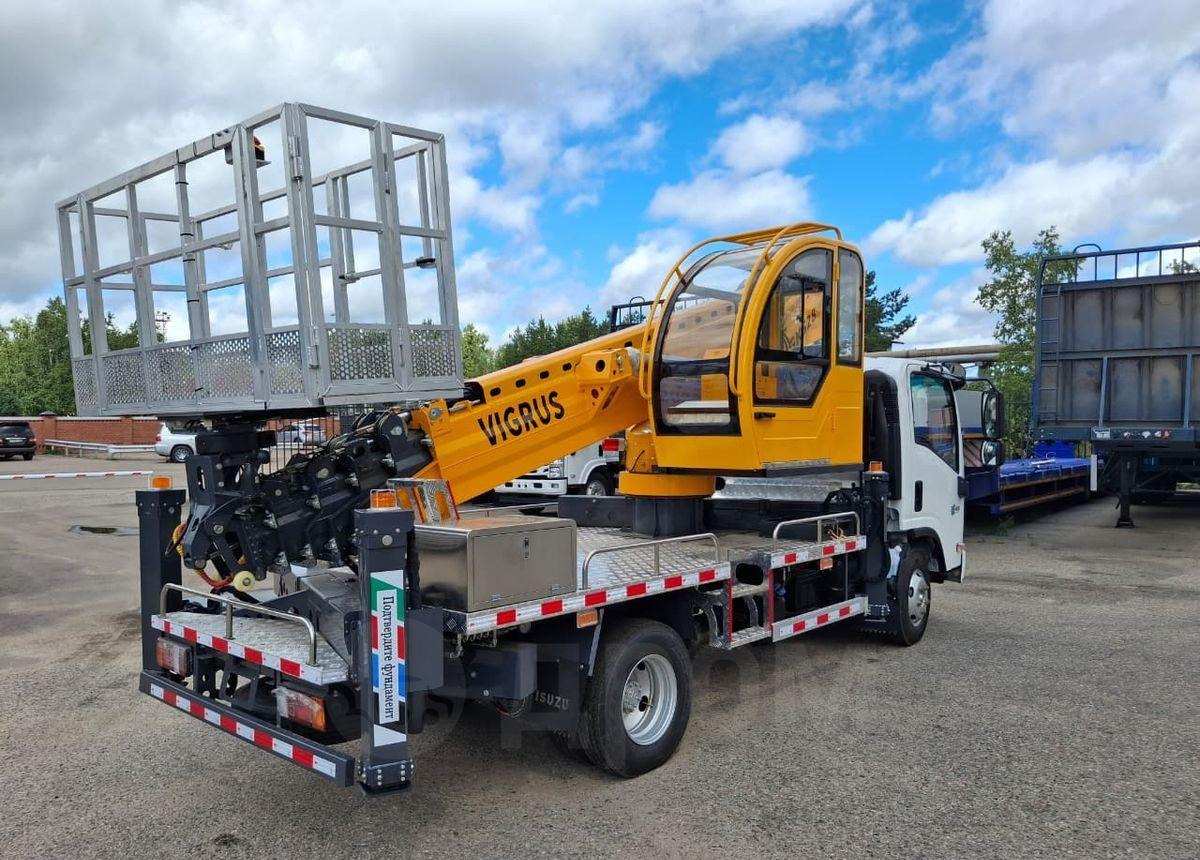 Новый Грузовик с подъемником Isuzu Elf: фото 12 Новый Грузовик с подъемником Isuzu Elf: фото 12