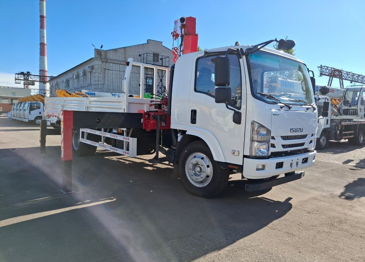 Isuzu Elf (N-series) - Грузовик бортовой/ Платформа, Автоманипулятор: фото 4 Isuzu Elf (N-series) - Грузовик бортовой/ Платформа, Автоманипулятор: фото 4