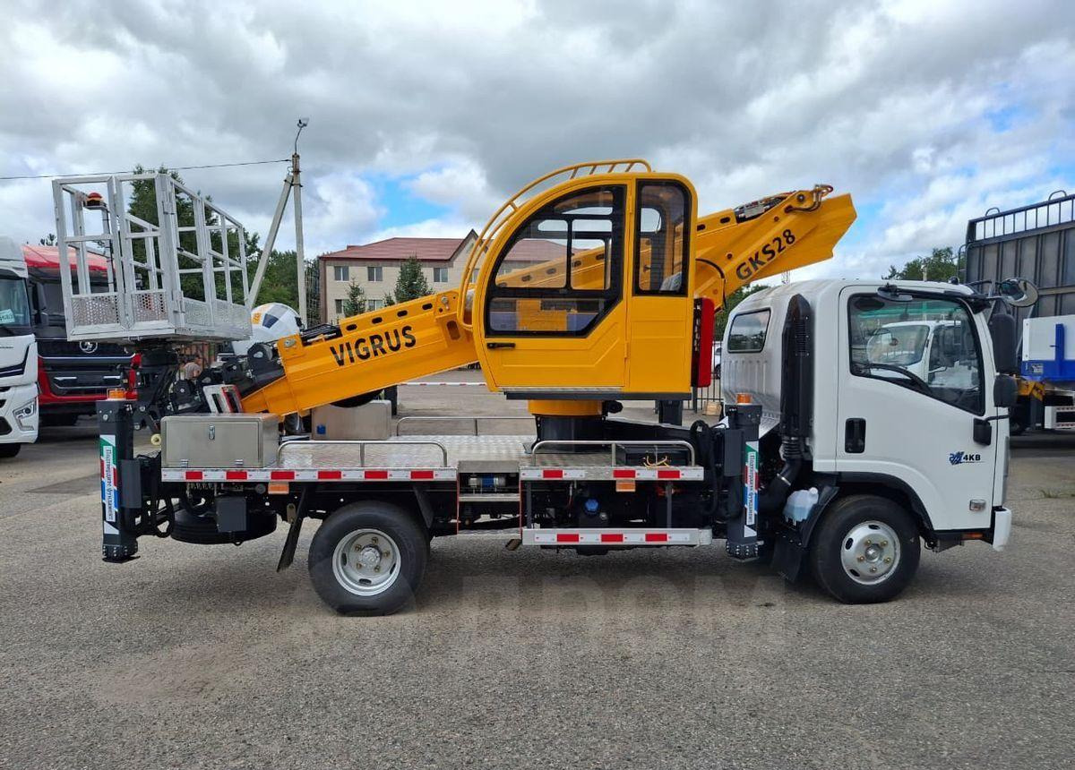 Isuzu Elf - Грузовик с подъемником: фото 2 Isuzu Elf - Грузовик с подъемником: фото 2