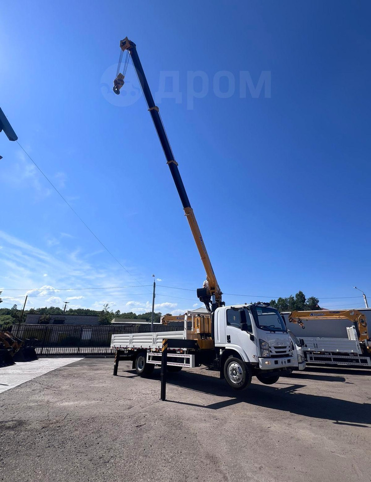 Isuzu Elf - Грузовик бортовой/ Платформа, Автоманипулятор: фото 3 Isuzu Elf - Грузовик бортовой/ Платформа, Автоманипулятор: фото 3