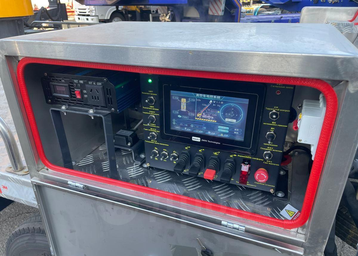 Isuzu Elf - Грузовик с подъемником: фото 5 Isuzu Elf - Грузовик с подъемником: фото 5