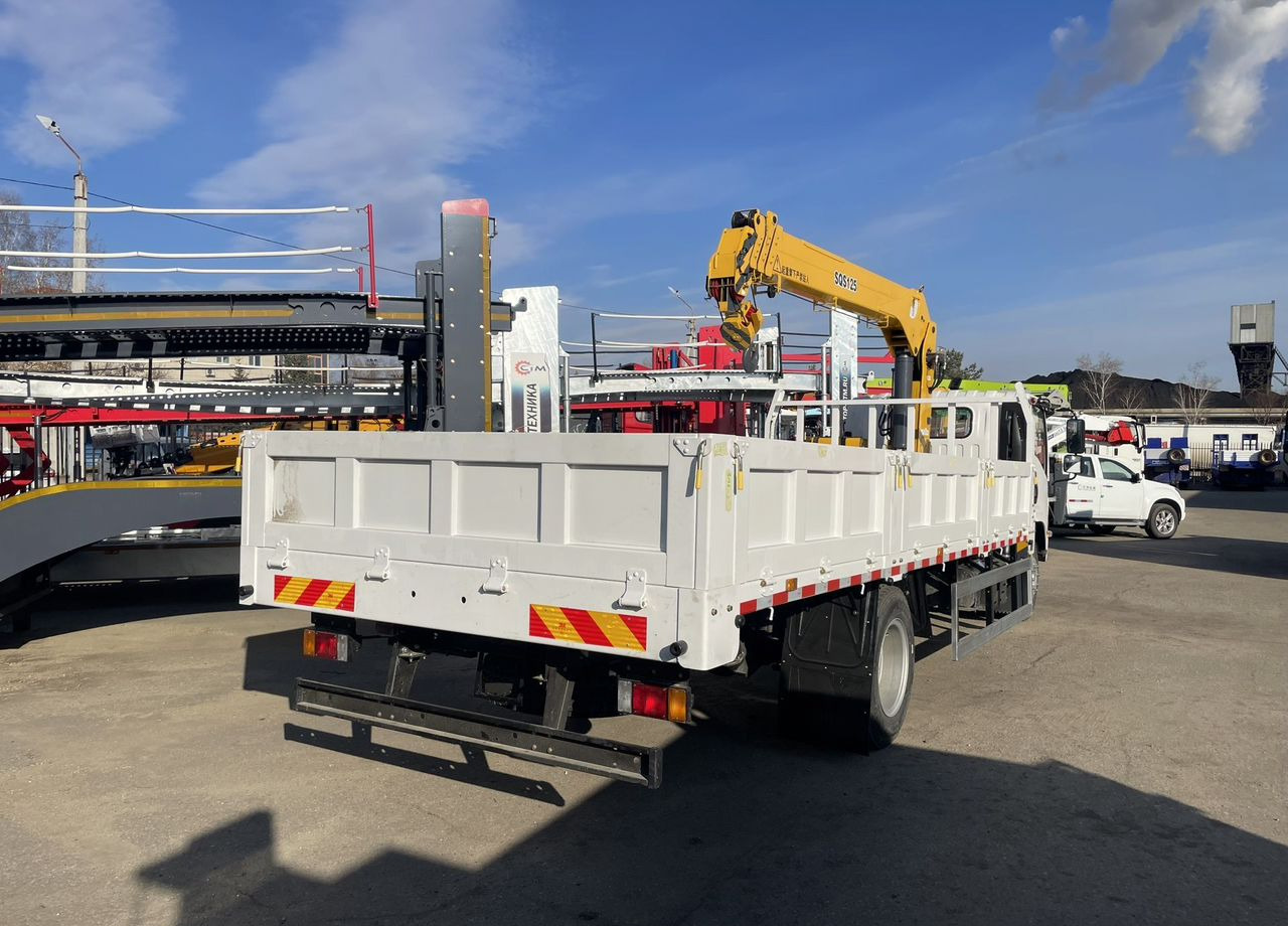 Isuzu Elf - Грузовик бортовой/ Платформа, Автоманипулятор: фото 3 Isuzu Elf - Грузовик бортовой/ Платформа, Автоманипулятор: фото 3