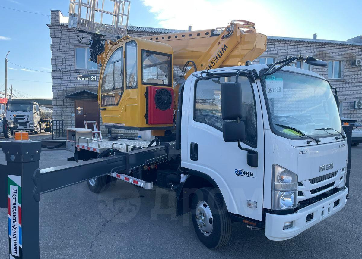 Isuzu Elf - Грузовик с подъемником: фото 1 Isuzu Elf - Грузовик с подъемником: фото 1