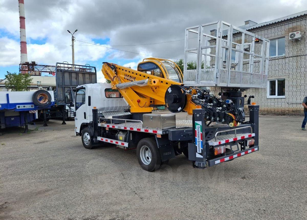 Isuzu Elf - Грузовик с подъемником: фото 5 Isuzu Elf - Грузовик с подъемником: фото 5