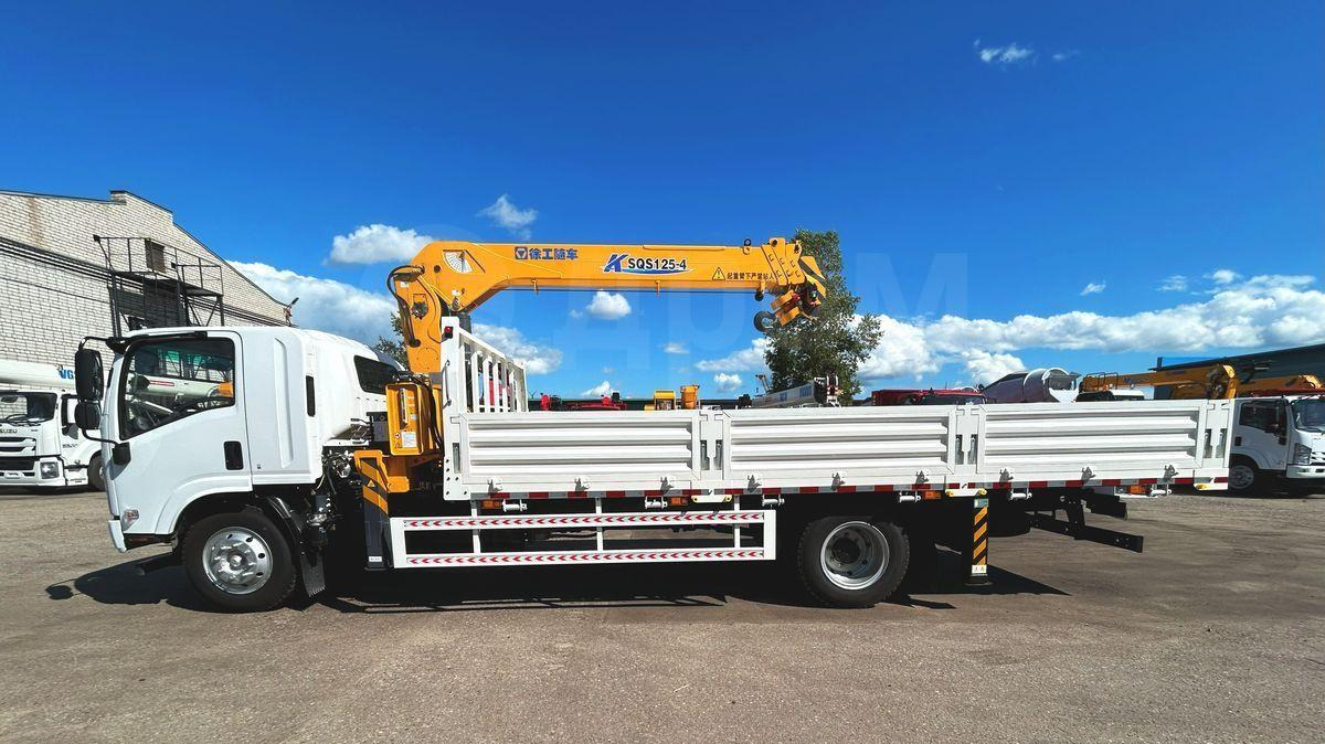 Isuzu Elf - Грузовик бортовой/ Платформа, Автоманипулятор: фото 2 Isuzu Elf - Грузовик бортовой/ Платформа, Автоманипулятор: фото 2