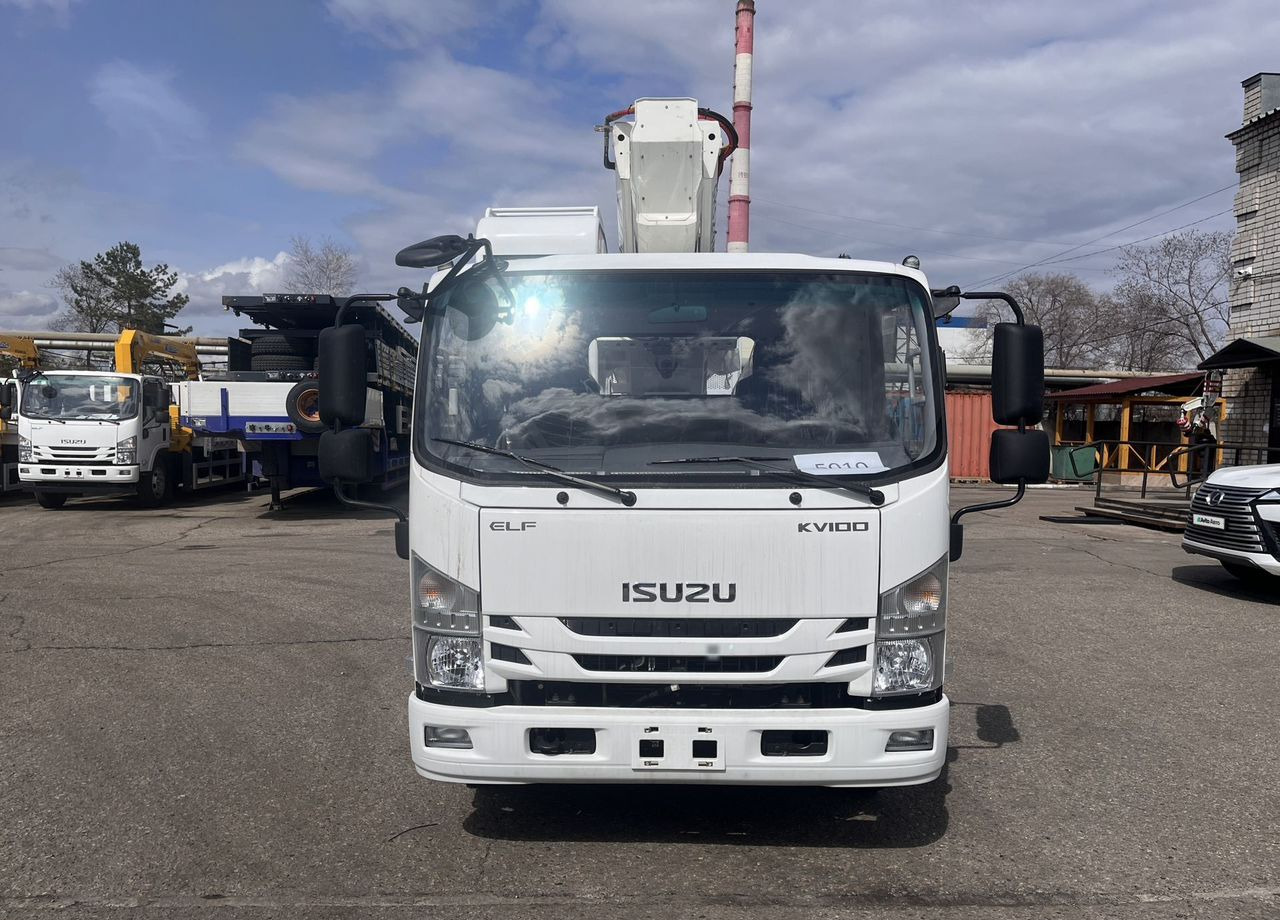 Isuzu Elf - Грузовик с подъемником: фото 4 Isuzu Elf - Грузовик с подъемником: фото 4