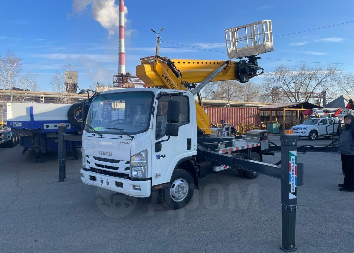 Isuzu Elf - Грузовик с подъемником: фото 2 Isuzu Elf - Грузовик с подъемником: фото 2