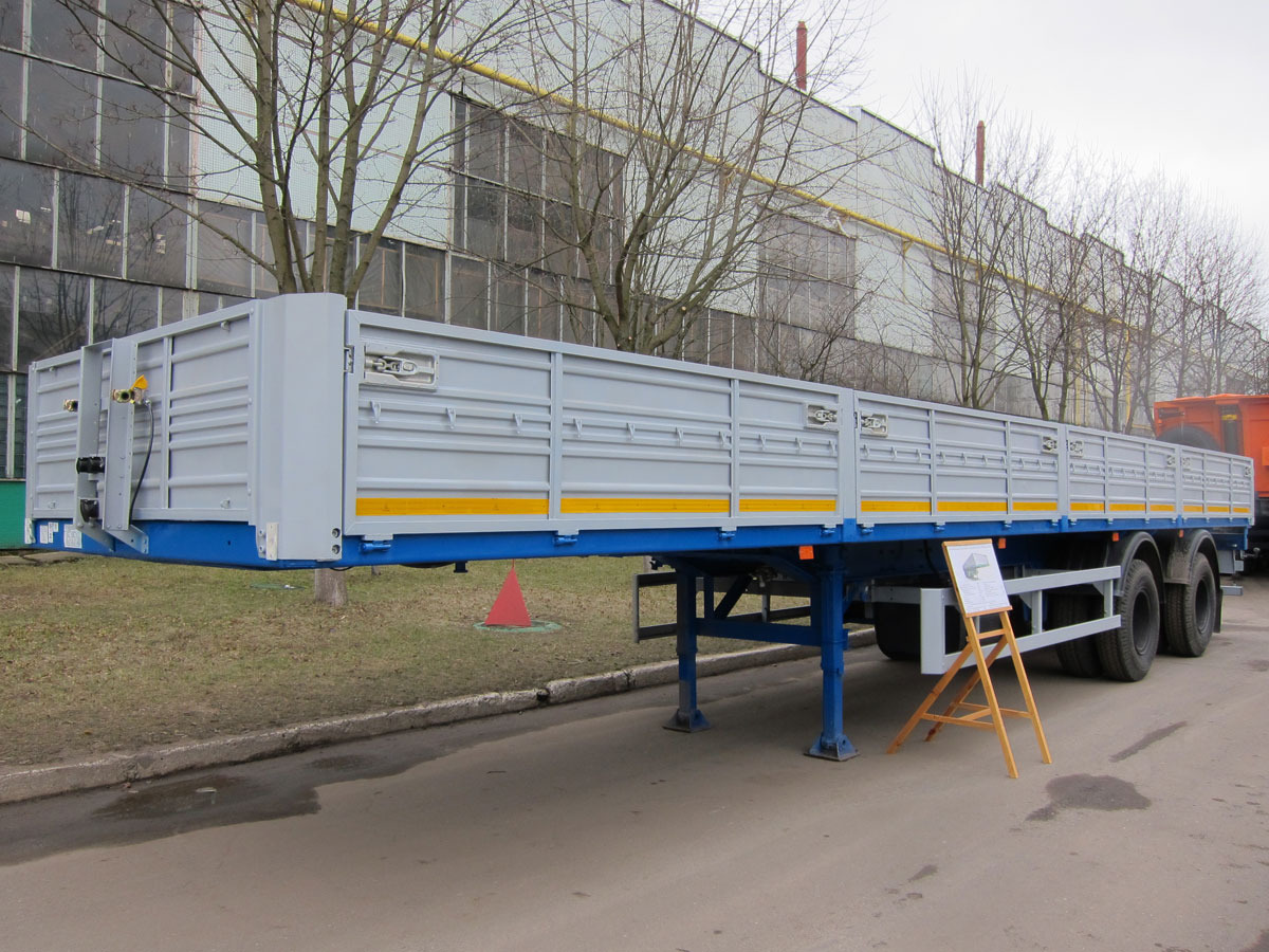 МАЗ 938660-2054 - Полуприцеп бортовой/ Платформа: фото 1 МАЗ 938660-2054 - Полуприцеп бортовой/ Платформа: фото 1