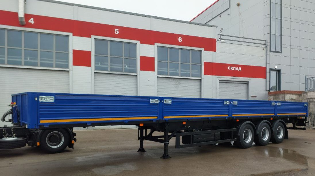 Полуприцеп МАЗ-975800-2010 - Полуприцеп бортовой/ Платформа: фото 1 Полуприцеп МАЗ-975800-2010 - Полуприцеп бортовой/ Платформа: фото 1