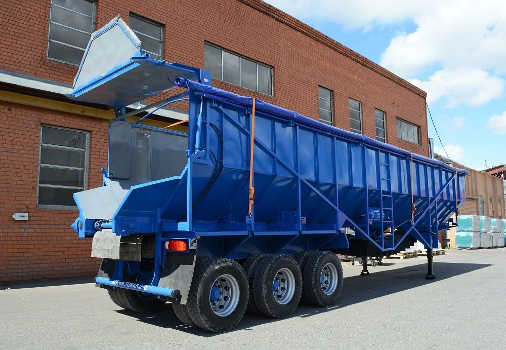 Полуприцеп-самосвал с донной разгрузкой Тонар-9591 - Самосвальный полуприцеп: фото 1 Полуприцеп-самосвал с донной разгрузкой Тонар-9591 - Самосвальный полуприцеп: фото 1