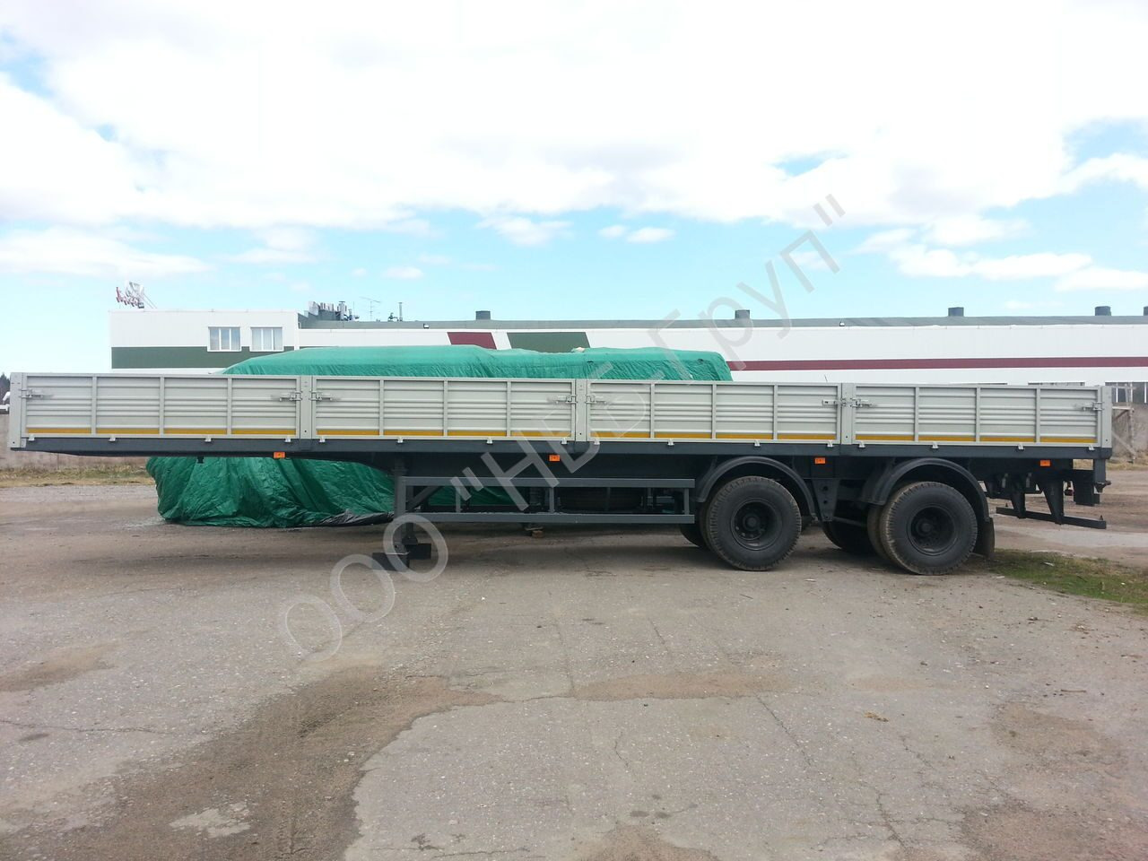 МАЗ-938662-2010 - Бортовой полуприцеп/ Платформа: фото 1 МАЗ-938662-2010 - Бортовой полуприцеп/ Платформа: фото 1