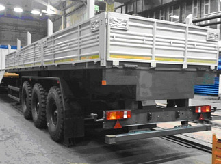 МАЗ-975800-2054 - Бортовой полуприцеп/ Платформа: фото 1 МАЗ-975800-2054 - Бортовой полуприцеп/ Платформа: фото 1