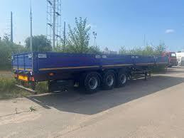 МАЗ-975830-2010Р - Бортовой полуприцеп/ Платформа: фото 1 МАЗ-975830-2010Р - Бортовой полуприцеп/ Платформа: фото 1