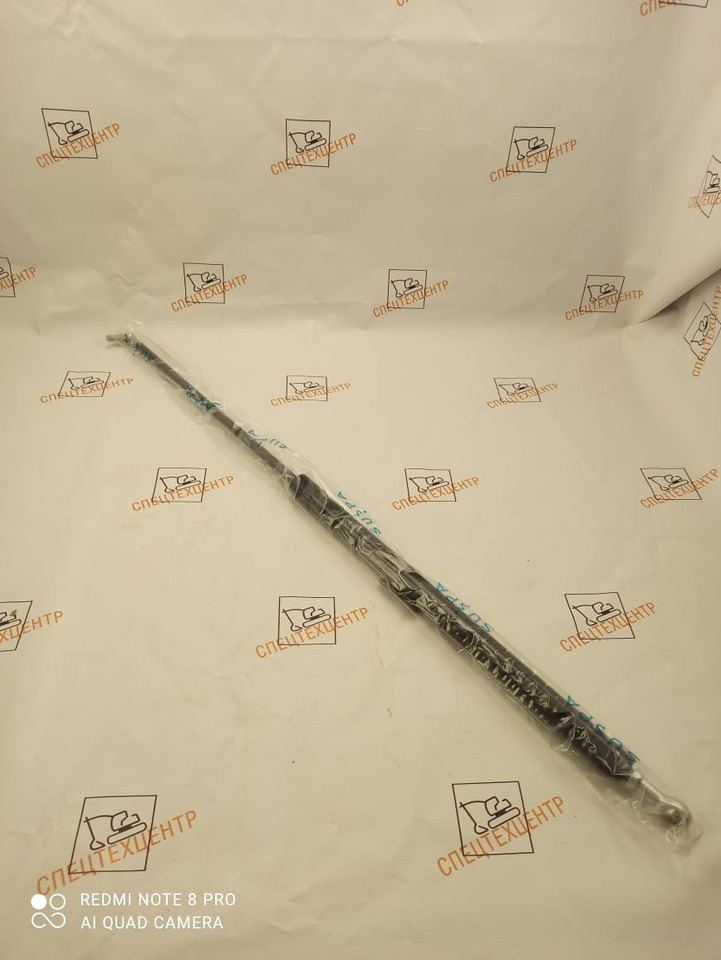 Газовый амортизатор капота SANY SW955 - Колёсный погрузчик: фото 1 Газовый амортизатор капота SANY SW955 - Колёсный погрузчик: фото 1