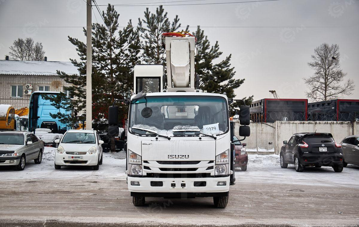 Isuzu Elf - Грузовик с подъемником: фото 1 Isuzu Elf - Грузовик с подъемником: фото 1