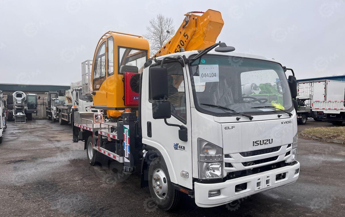 Isuzu Elf - Грузовик с подъемником: фото 2 Isuzu Elf - Грузовик с подъемником: фото 2