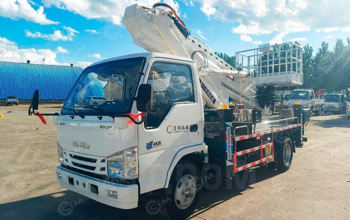 Isuzu Elf - Грузовик с подъемником: фото 1 Isuzu Elf - Грузовик с подъемником: фото 1