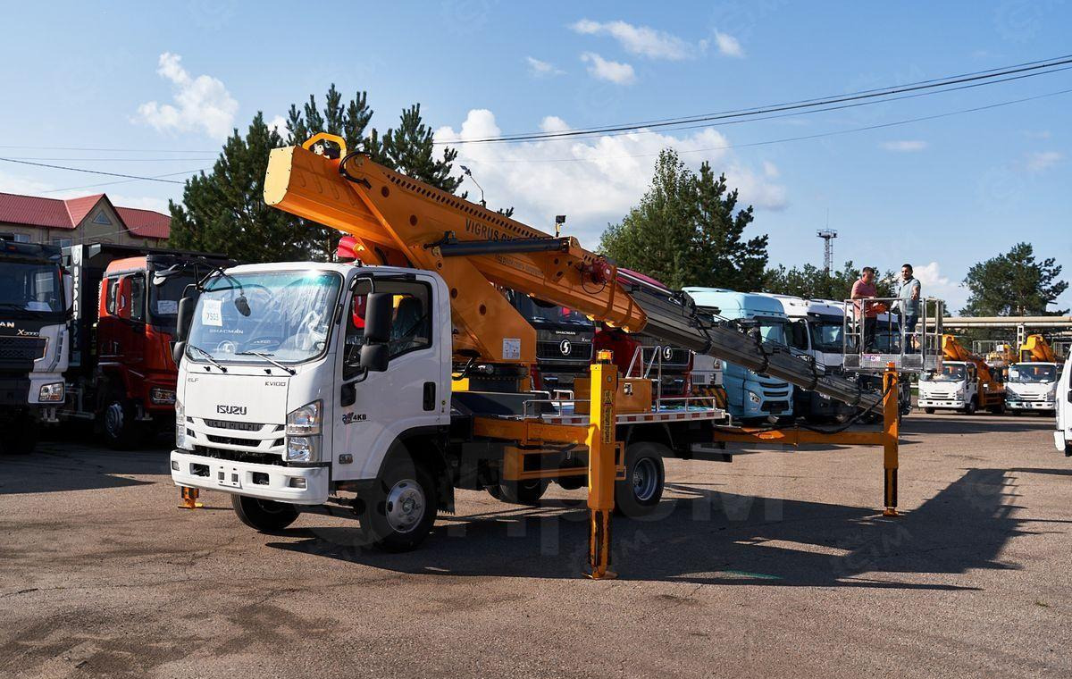 Isuzu Elf - Грузовик с подъемником: фото 4 Isuzu Elf - Грузовик с подъемником: фото 4